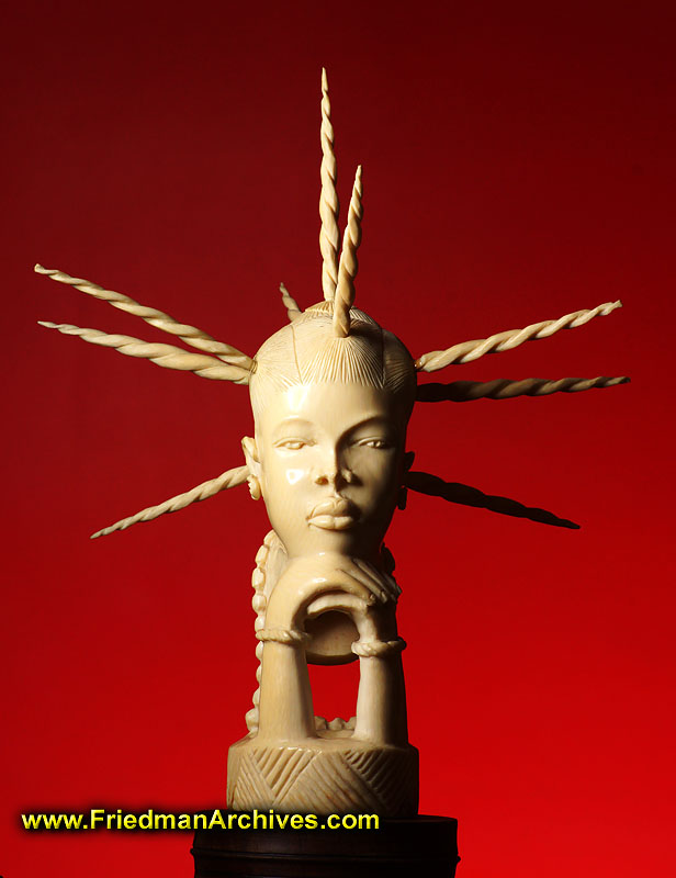 ivory,carving,red,wireless flash,african,woman,spikes,annoying,